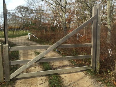 A fence with a gate extension